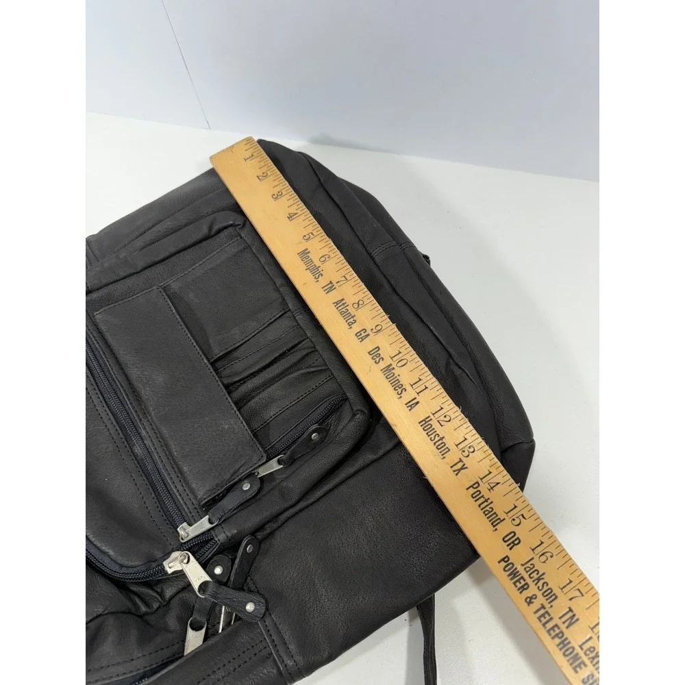 New United Motor Manufacturing Black Leather Backpack Multi Pocket YKK Zipper